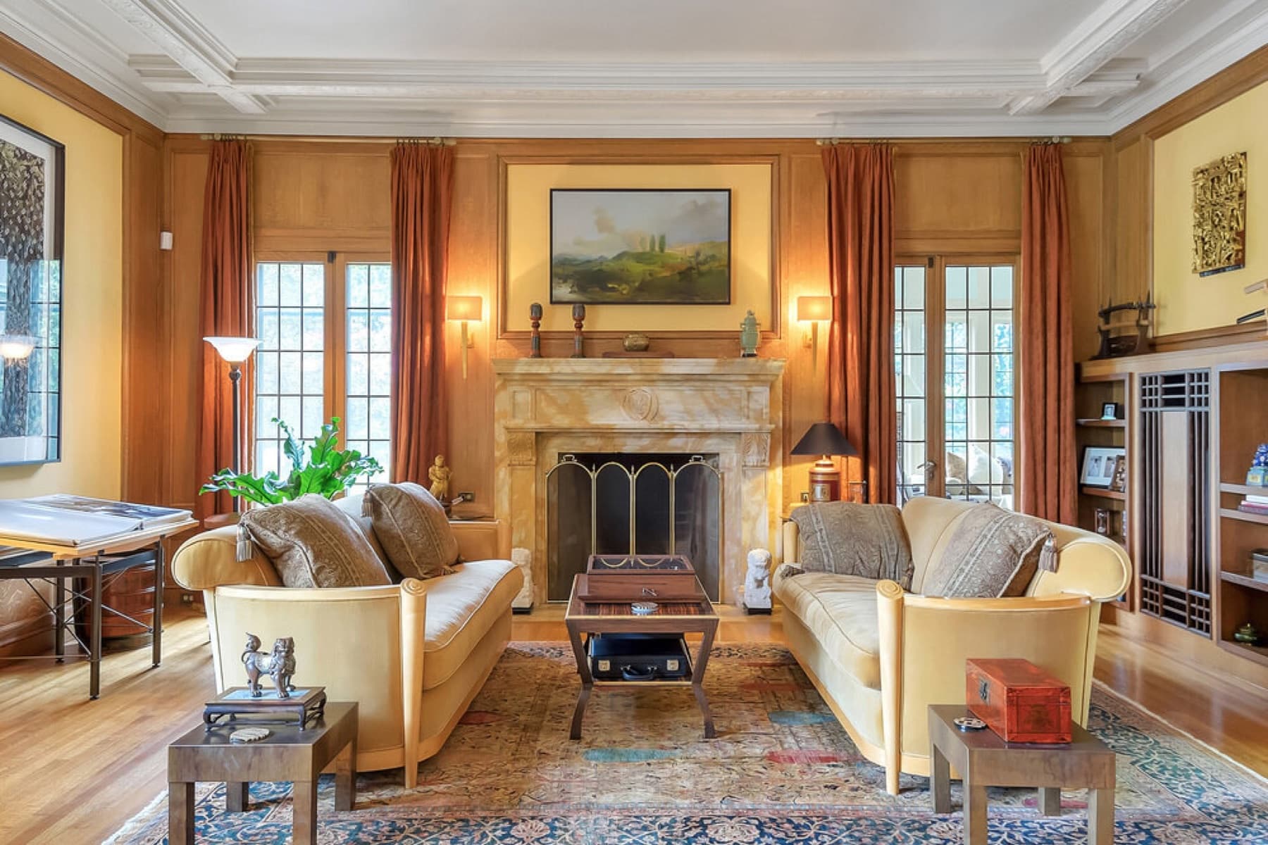 Wood-paneled living room with fireplace