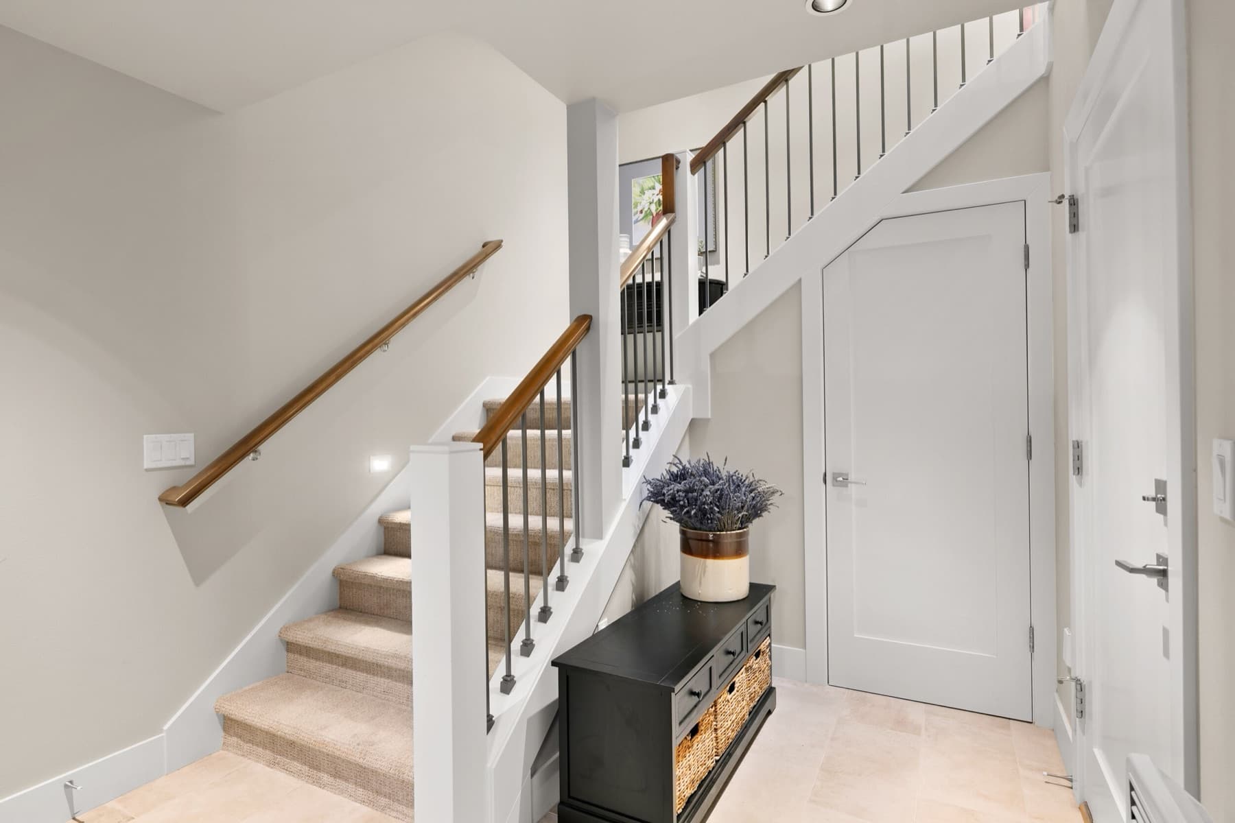 Bright entry hall with staircase